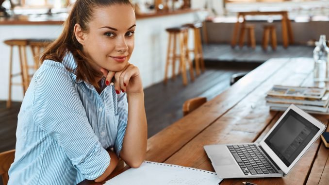 Learning, Studying. Woman Using Laptop Computer At Cafe, Working